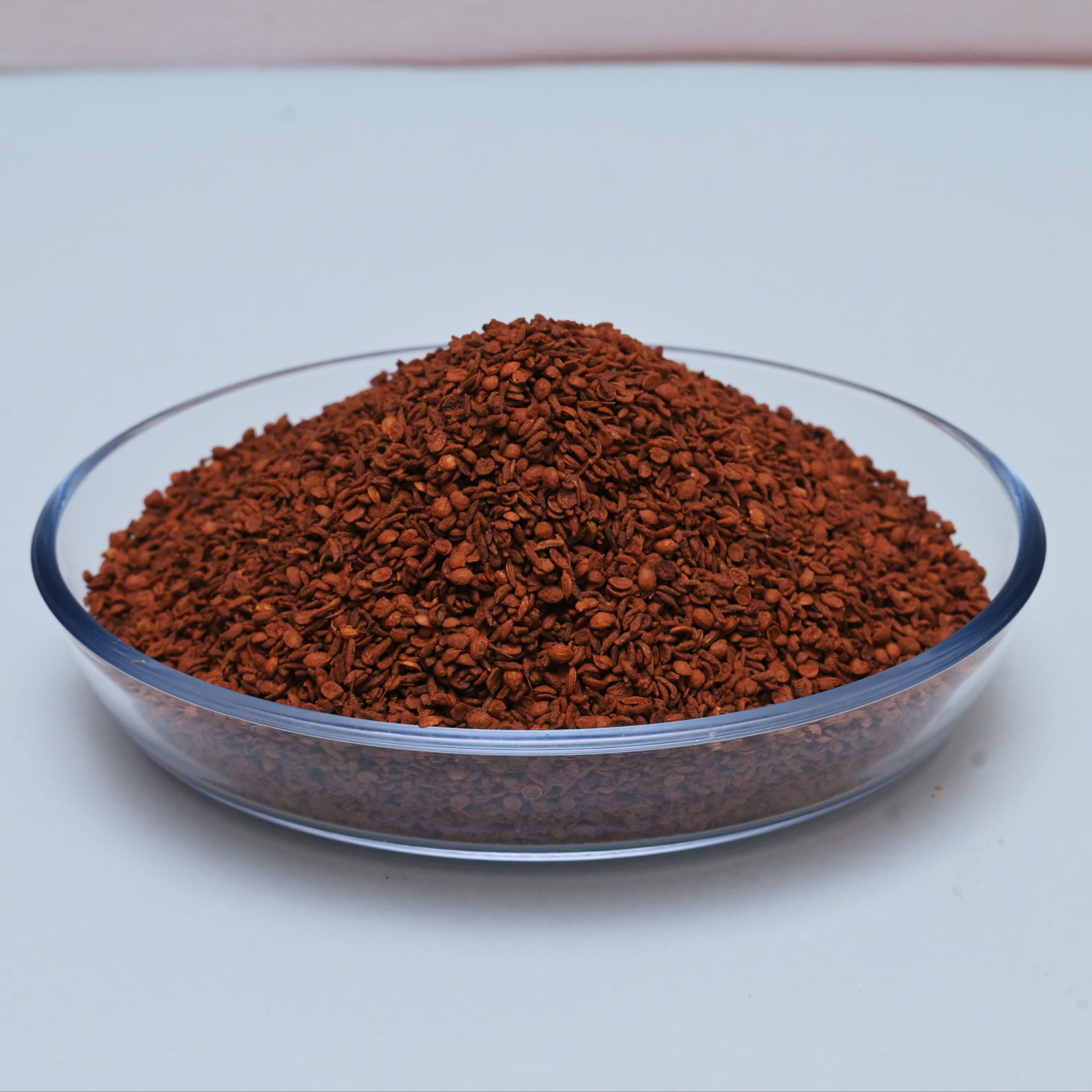 Homemade Sounf Churi by Bhairudan and Sons, 250 grams, close-up of golden fennel seeds in a clear container.